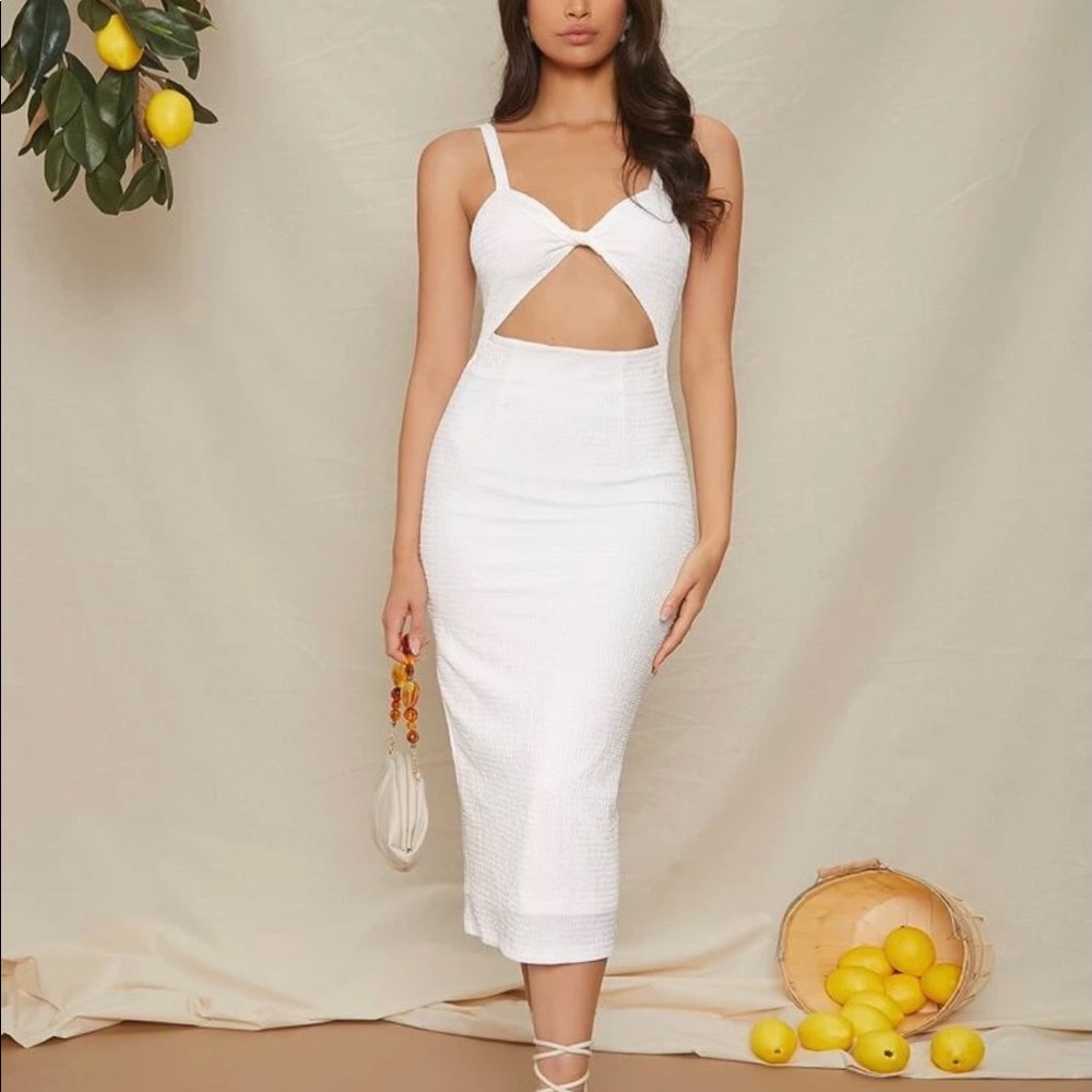 White midi dress with twist front cutout. size M